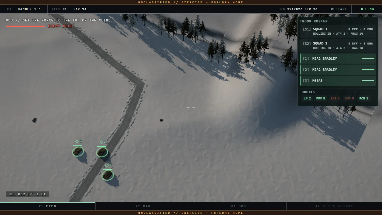 Drone feed over a snowy climb, three vehicles on the road